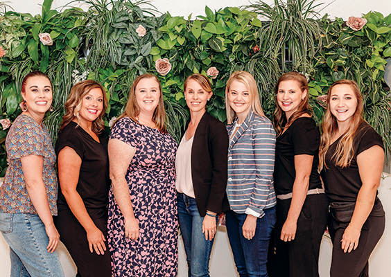 Sara Sparhawk and Lyn Johnson (third and fourth from the left) network with and mentor other female entrepreneurs at regional collaborative events. Photo courtesy West Tenth.
