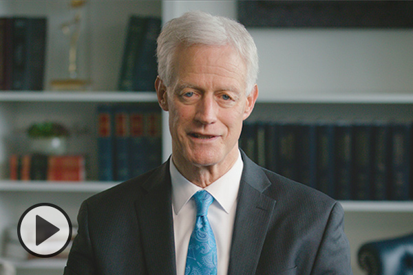 Screen grab of President Worthen with video icon.