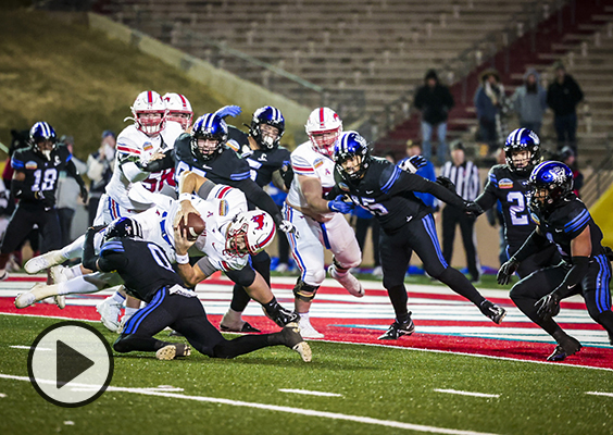 The last play of the New Mexico Bowl shows a BYU defender tackling the SMU quarterback.