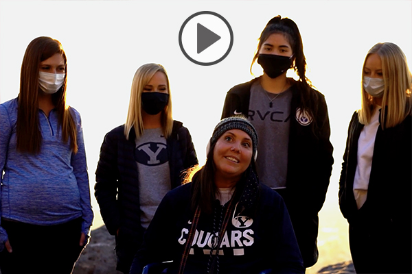 Five young female BYU students gather before ascending Y Mountain.