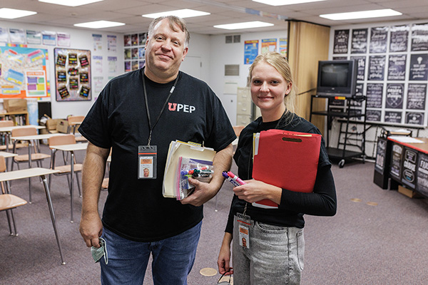 BYU history professor Matt Mason teaches American history in the Utah State Prison with Kate Rolfson, a social-sciences teaching major, as volunteers for the University of Utah Prison Education Program. Photo by Bradley Slade.