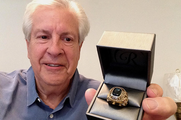 BYU grad Eric Paul shows off the recently returned class ring he had lost some 50 years ago.