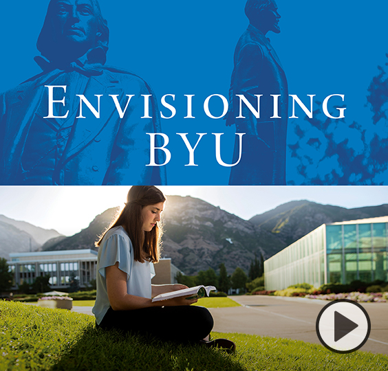 Statues of Karl Maeser and Brigham Young on a blue background with the words Envisioning BYU. A second image just below shows a female student studying on the grass near the campus library as the sun rises over Y Mountain. Photo by Bradley Slade.