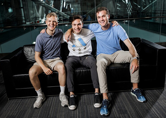 Team Zaymo on a bench in teh business school. From left to right: Brice Douglas, Santiago Gomez-Paz, and Danny Jones. BYU Photo.