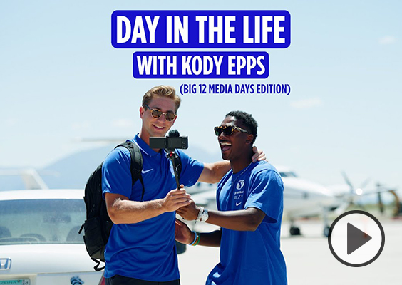 Day in the Life with Kody Epps | Big 12 Media Days Edition | Epps and Kedon SLovis stand on an airport runway, filming with a camera on a selfie stick.