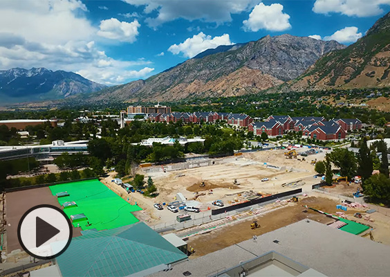 Bright green on the library roof contrasts with the dirt being prepared for the new Arts Building.