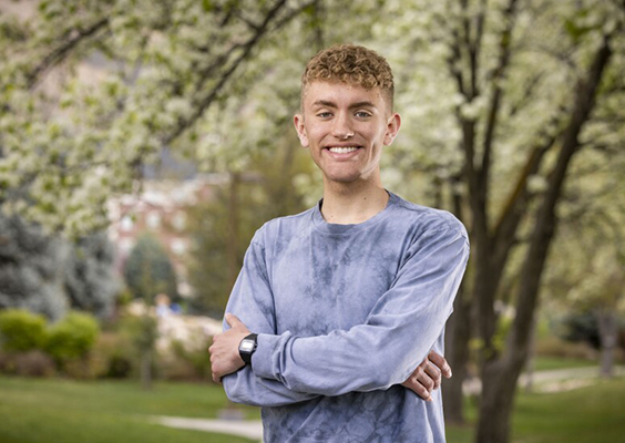 Despite a busy school schedule, Ethan Hardy has volunteered as a piano teacher at Provo's South Franklin Community Center. Photo by Joey Garrison of BYU Photo.