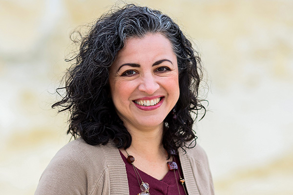 Portrait of a smiling Natalia Benjamin.