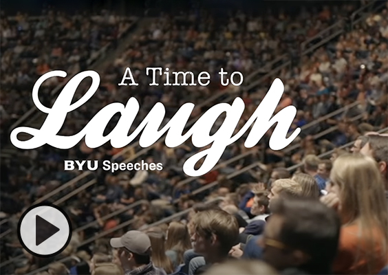 A devotional audience chuckles in teh Marriott Center. A Time to Laugh. BYU Speeches.