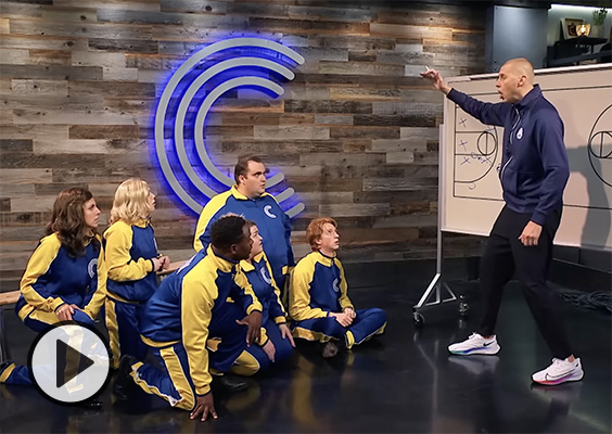 BYU head basketball coach Mark Pope diagrams a play for the cast of Studio C.