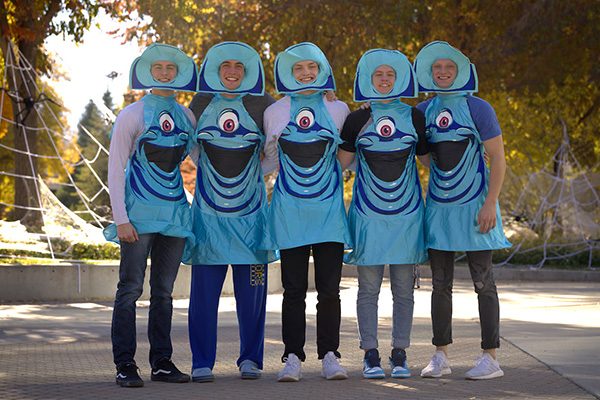 Five BYU students are dressed as the blue single-eyed monster Bob from Monsters versus Aliens.