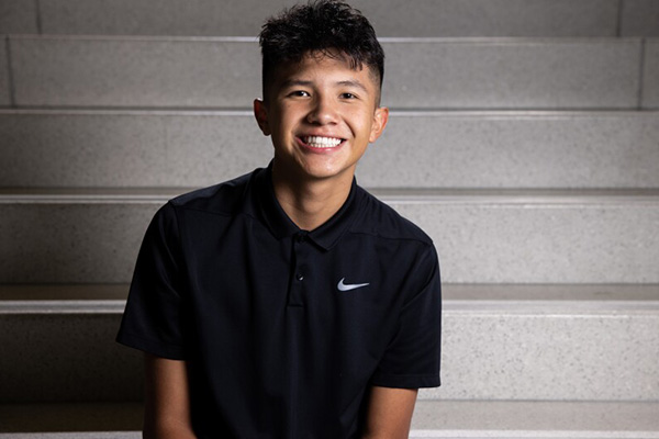 Thanks to a generous scholarship from the Utah Jazz, BYU freshmen George Martinez, pictured in a black polo, is making the most of his college experience. Photo by Matthew Norton/BYU Photo.