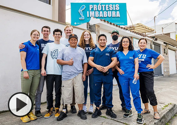 Students engineers, prosthetic patients, and clinic staff pose for a photo outside of Protesis Imbabura in Ibarra, Ecuador.