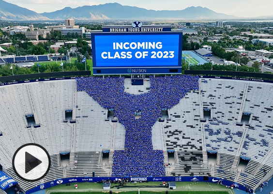 The incoming class of 2023 BYU students form a human Y in the south end of LaVell Edwards Stadium.