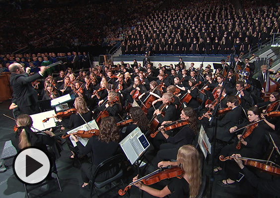 BYU’s Combined Choirs and Philharmonic Orchestra perform in the Marriott Center during inauguration.